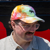 Person wearing Equator Coffees Pride Hat | Equator Coffees