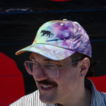 Person wearing Equator Coffees Pride Hat | Equator Coffees