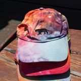 Stack of Equator Coffees Pride Hats | Equator Coffees