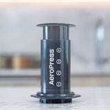 Displaying the AeroPress Original Coffee Maker on the kitchen counter before brewing | Equator Coffees