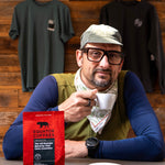 Chef Chris Cosentino posing with a bag of his Equator Coffees signature blend | Equator Coffees