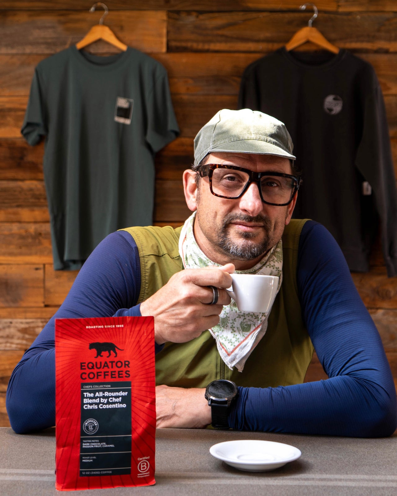 Chef Chris Cosentino posing with a bag of his Equator Coffees signature blend | Equator Coffees