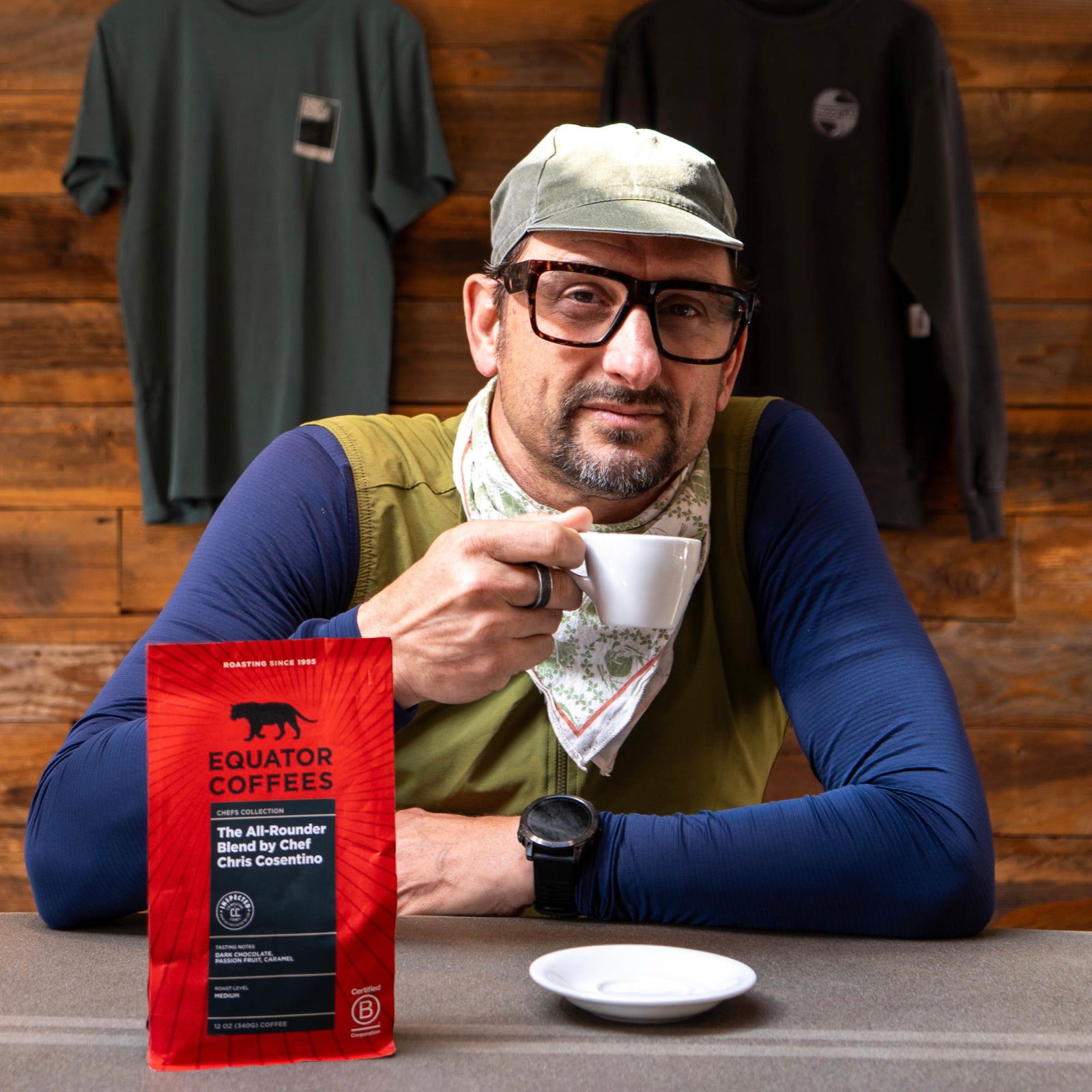 Chef Chris Cosentino posing with a bag of his Equator Coffees signature blend | Equator Coffees