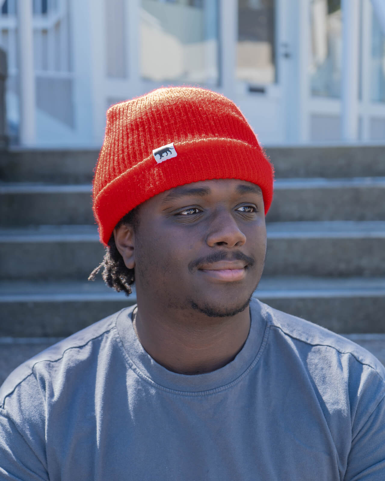 Using the Equator Red Waffle Beanie to warm up on a chilly Bay Area day | Equator Coffees