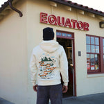 Guest with the Equator in Motion Zip Hoodie arrives at the Fort Mason Equator Cafe in San Francisco for a cup of coffee | Equator Coffees
