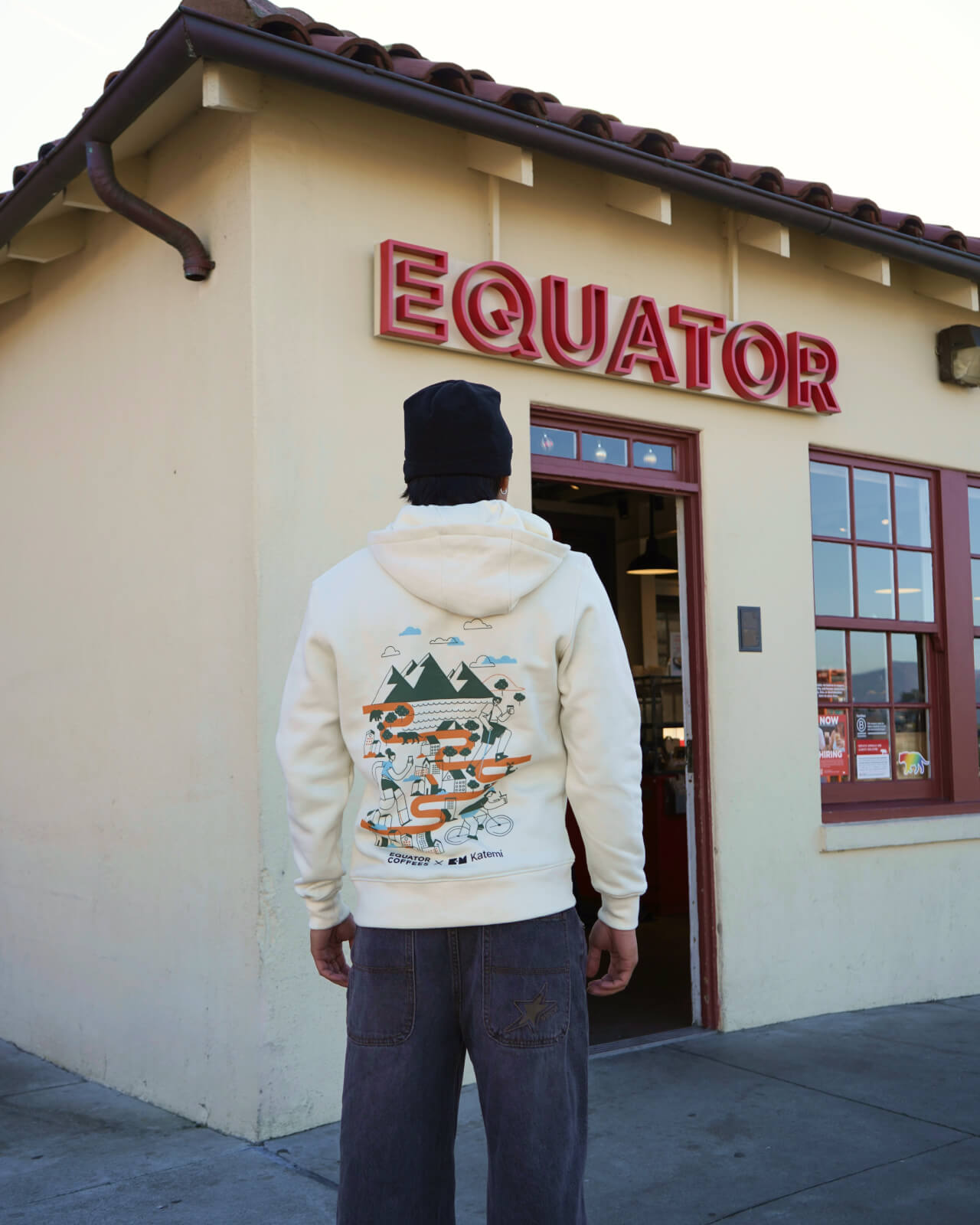 Guest with the Equator in Motion Zip Hoodie arrives at the Fort Mason Equator Cafe in San Francisco for a cup of coffee | Equator Coffees