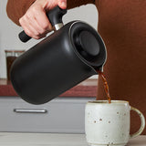 Pouring a delicious cup of specialty coffee at home with the Fellow Clara French Press | Equator Coffees