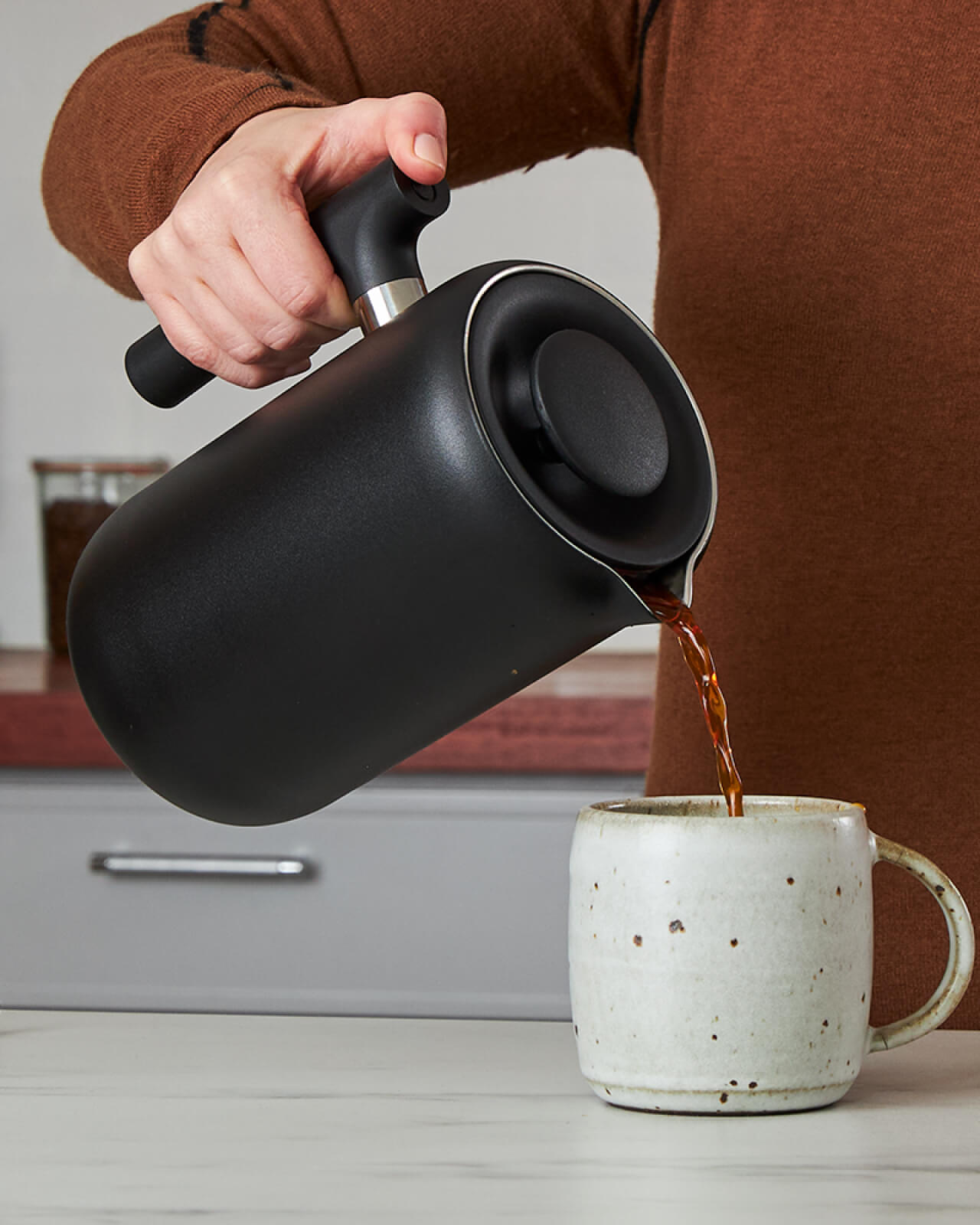 Pouring a delicious cup of specialty coffee at home with the Fellow Clara French Press | Equator Coffees