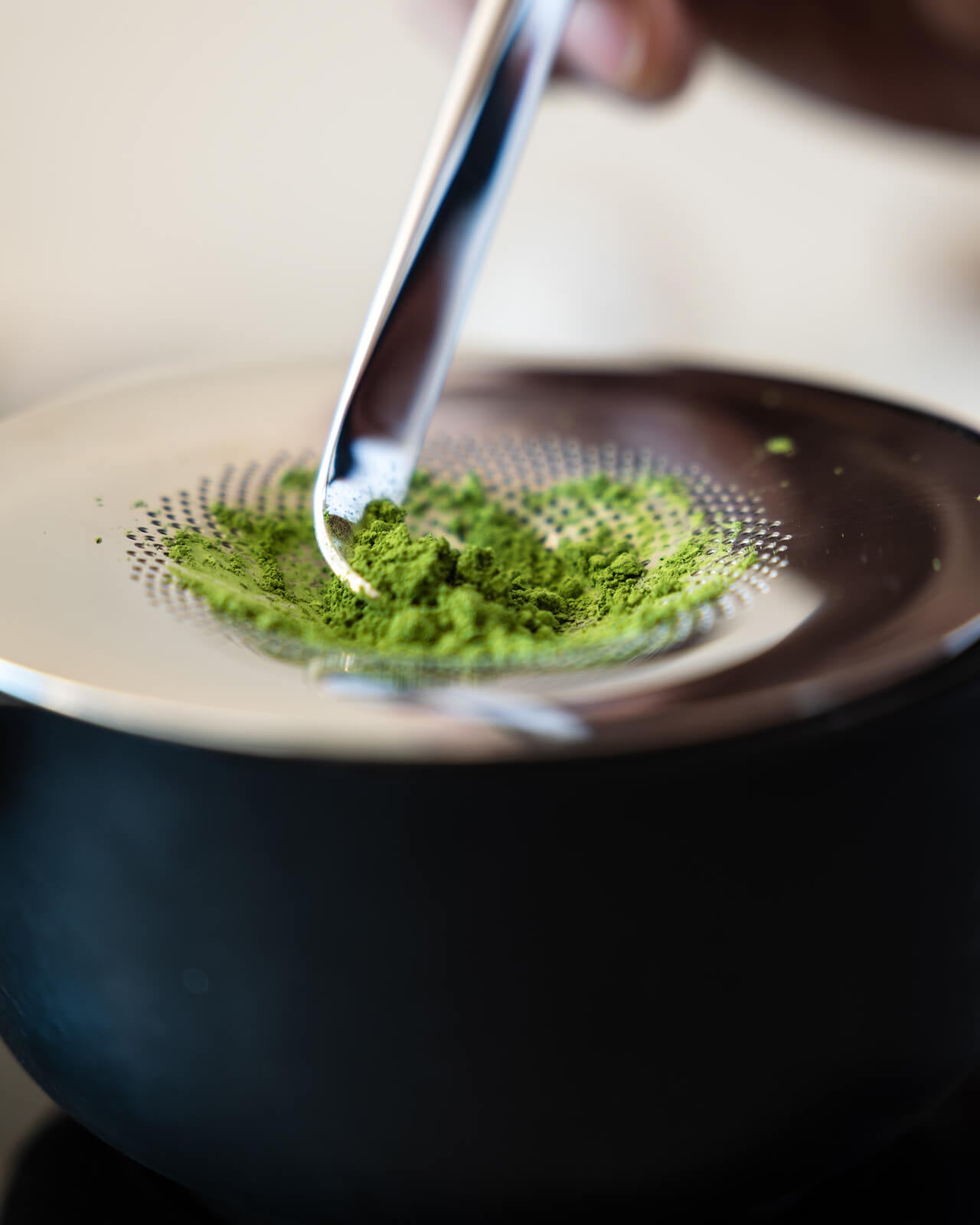 Fellow Matcha Set | Matcha powder being sifted through a sifter | Equator Coffees