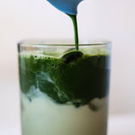Fellow Matcha Set | Matcha being poured into a glass with ice | Equator Coffees