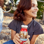Happy and content with a refreshing bottle  Hint of Vanilla Organic Cold Brew Coffee | Equator Coffees