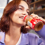 Sipping a Hint of Milk & Sugar Organic Cold Brew Coffee on a hot summer day | Equator Coffees