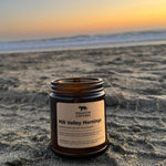 The Mill Valley Mornings candle makes an appearance at Muir Beach to enjoy a beautiful sunset over the ocean | Equator Coffees