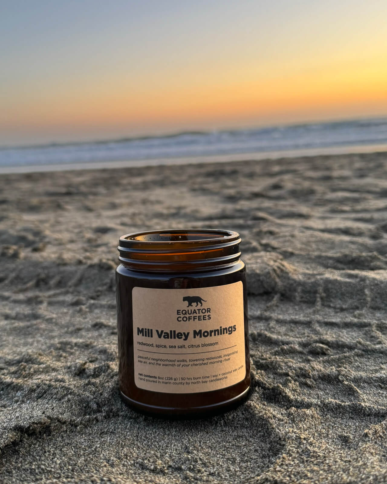 The Mill Valley Mornings candle makes an appearance at Muir Beach to enjoy a beautiful sunset over the ocean | Equator Coffees