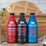An ensemble of 42 fl oz bottles of Equator cold brew coffees: Perfectly Seet, Smooth Black, and Simply Decaf | Equator Coffees