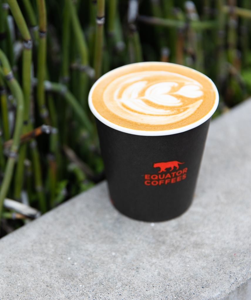 Black Equator Coffees coffee cup with latte art | Equator Coffees