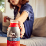 Reaching for a Pure Black Organic Cold Brew during a long study session | Equator Coffees