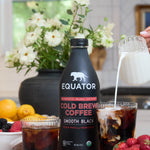 Smooth Black Organic Cold Brew Coffee | Serving up delicious cold brew coffee with cream and a side of strawberries | Equator Coffees