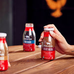 Opening up a refreshing bottle of Velvet Mocha Organic Cold Brew Coffee to enjoy during a day on the go | Equator Coffees